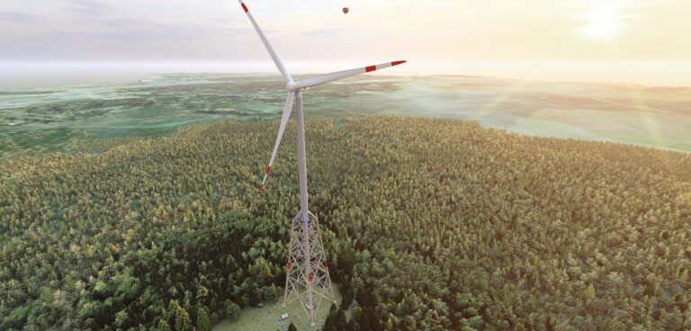 Aerial view of a wood-hybrid tower of a wind turbine, blending harmoniously into the surrounding landscape. © vom-creations.com